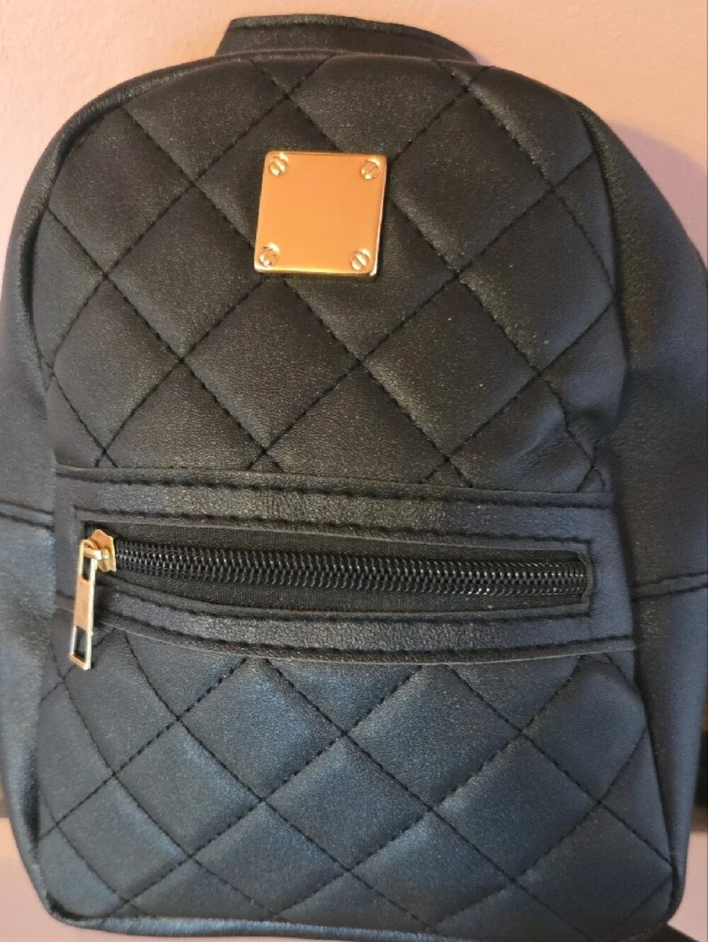 Quilted Black Mini Backpack with Gold Accent
